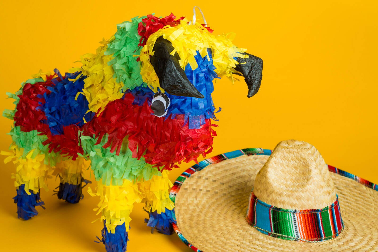 The Stories Behind the Swing: The colorful history of Mexican Piñatas!