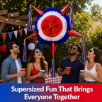 Group of people celebrating outdoors with a large red, white, and blue star-shaped piñata.
