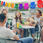lucha libre masks outdoor party at table with guitar